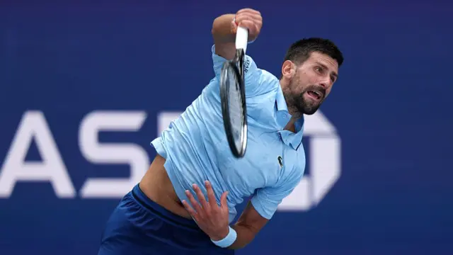 Novak Djokovic of Serbia serves