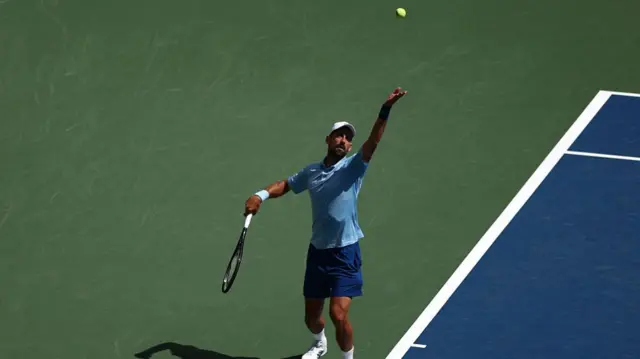Novak Djokovic of Serbia serves