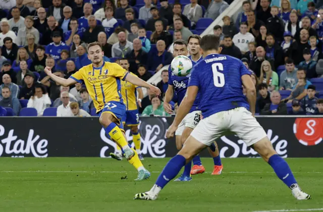 Mansfield Town's Luke Bolton shoots at goal
