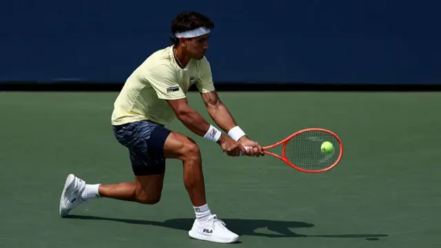 Francisco Comesana hits a backhand