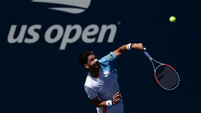 Cameron Norrie of Great Britain serves