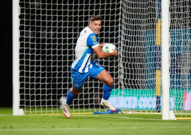 Brighton and Hove Albion's Stefanos Tzimas celebrates after scoring his sides fourth goal