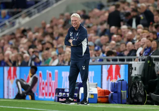 David Moyes looks on.