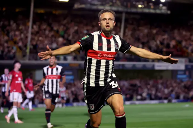 Grimsby Town’s Charles Vernam celebrates scoring their side's first goal of the game