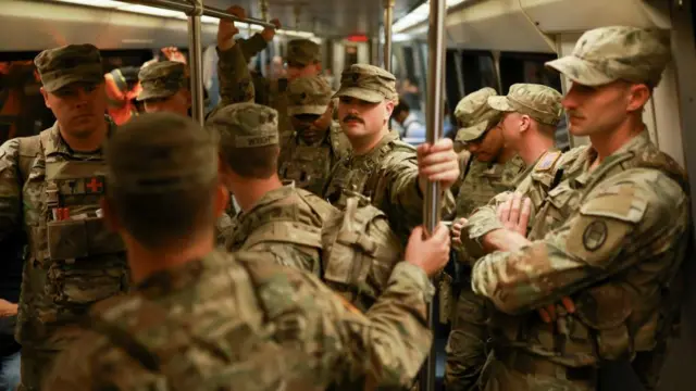 Troops from the South Carolina National Guard ride the DC Metro Tuesday, 26 August 2025