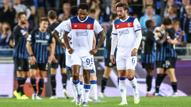 Rangers players looking disappointed after conceding a goal during their 6-0 defeat by Club Brugge