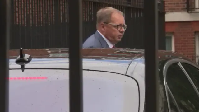 Kelin seen between bars of gates