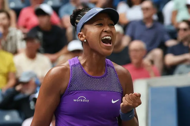Naomi Osaka celebrates