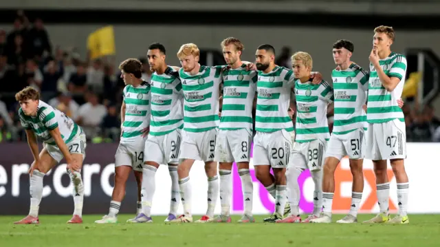 Celtic players look on during penalty shoot-out