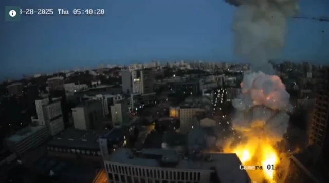 A still taken from CCTV footage that captured a strike on a building in Kyiv
