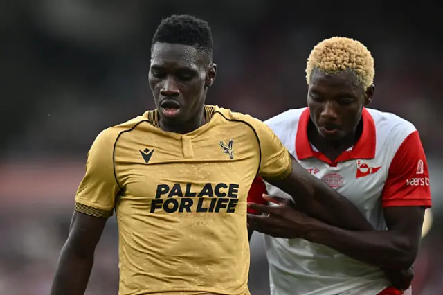 Ismaila Sarr of Crystal Palace and Maxwell Woledz of Fredrikstad