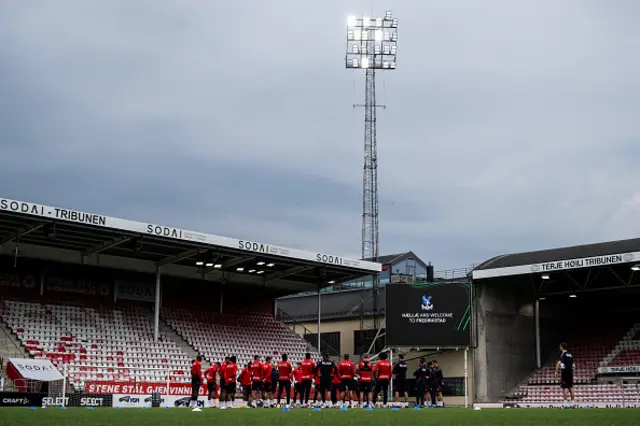 Team huddle of Crystal Palace players and staff