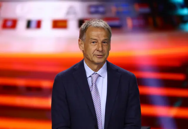 Former footballer Jurgen Klinsmann ahead of the draw.