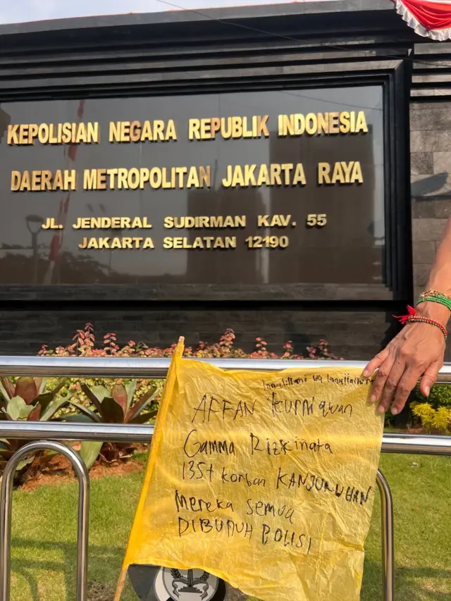 Yellow banner in front of a police office in Jakarta Indonesia