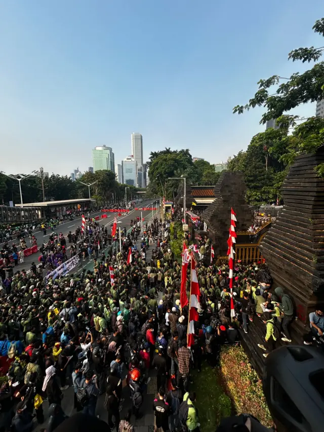 Protesters gather outside Polda Metro Jaya in Jakarta Indonesia