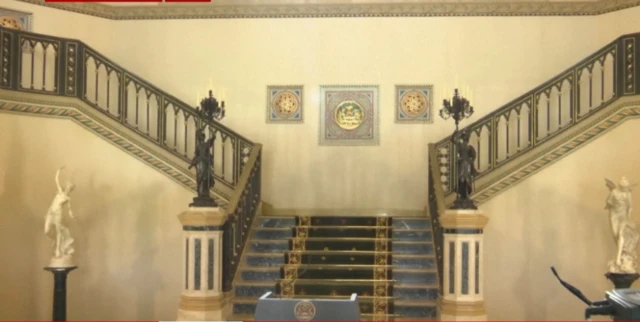 An empty podium is seen ahead of a press conference