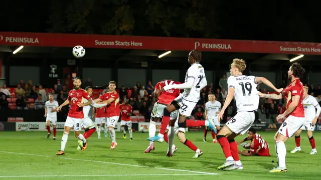 Kadeem Harris heads Salford's equaliser against Cheltenham