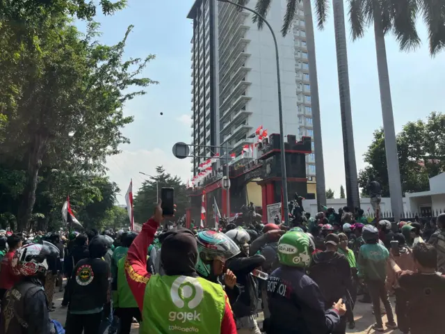 Protesters gather outside a police station in central Jakarta Indonesia