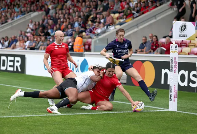 Julia Schell scores for Canada against Fiji at the Rugby World Cup in York