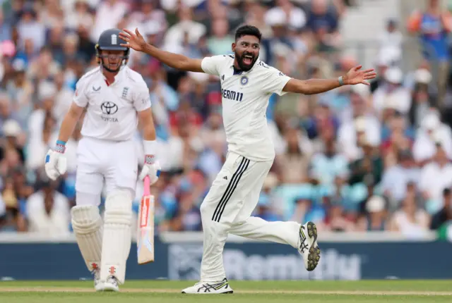 Mohammed Siraj of India appeals successfully for the wicket of Ollie Pope of England