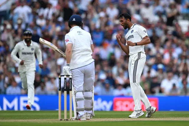 Krishna celebrates the wicket of Duckett
