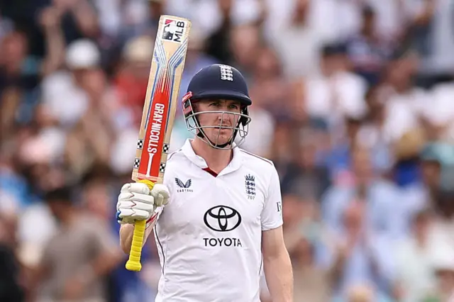 Harry Brook celebrates his half-century