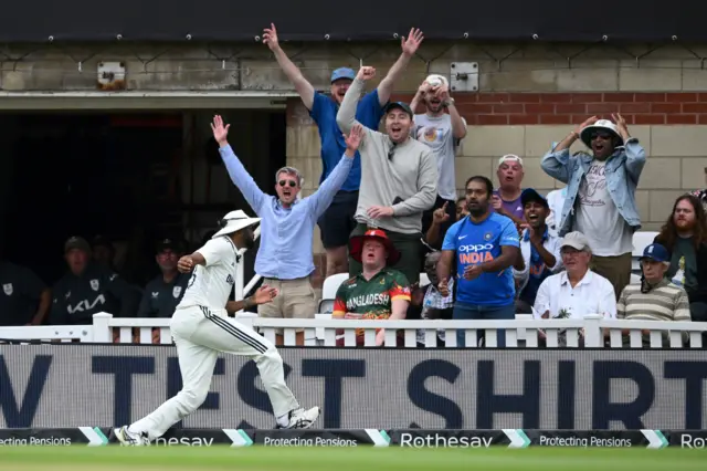 Mohammed Siraj falls over boundary rope