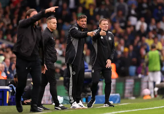 Jason Tindall, Assistant Manager of Newcastle United, and Eddie Howe, Manager of Newcastle United, react during the Premier League match between Leeds United and Newcastle United at Elland Road on August 30, 2025 in Leeds, England.