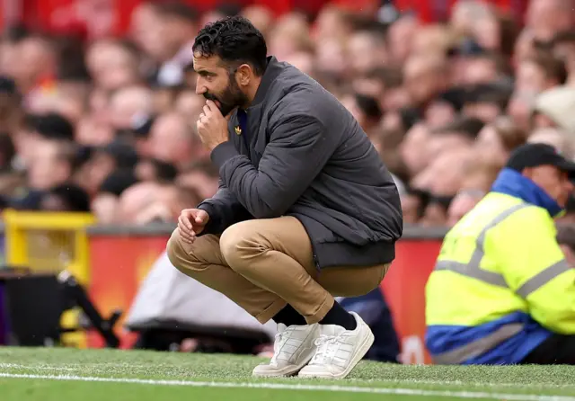 Manchester United manager Ruben Amorim watches from the touchline