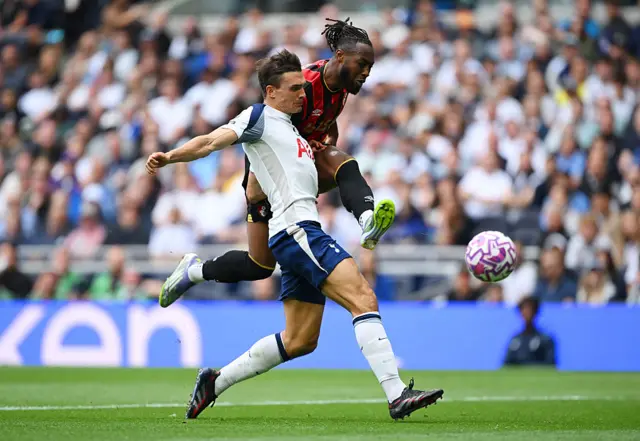 Antoine Semenyo of AFC Bournemouth shoots past Joao Palhinha of Tottenham Hotspur during the Premier League match between Tottenham Hotspur and Bournemouth at Tottenham Hotspur Stadium on August 30, 2025 in London, England.