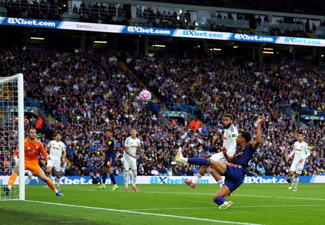 Jacob Murphy of Newcastle United shoots during the Premier League match between Leeds United and Newcastle United at Elland Road on August 30, 2025 in Leeds, England.