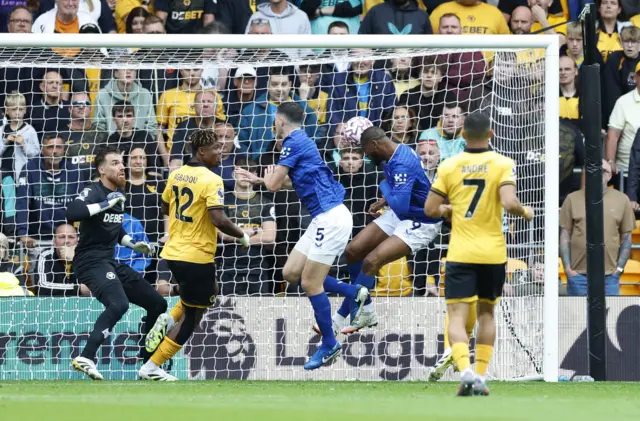 Everton's Beto scores their first goal.
