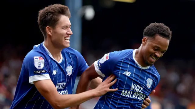 Cardiff players celebrate a goal