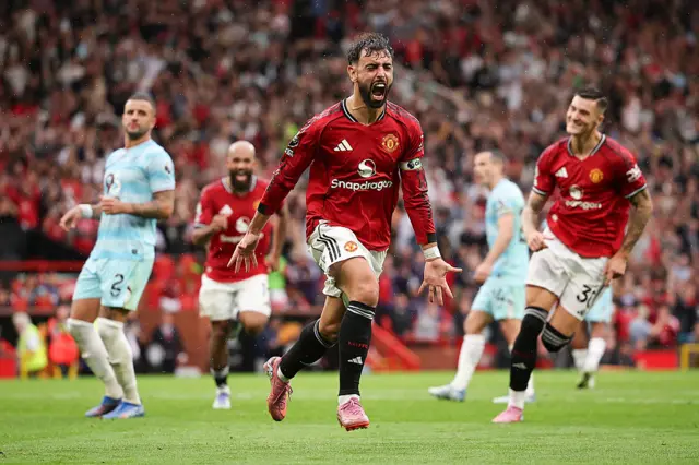 Bruno Fernandes of Manchester United celebrates after scoring their third goal to make the score 3-2 during the Premier League match between Manchester United and Burnley at Old Trafford on August 30, 2025 in Manchester, England.