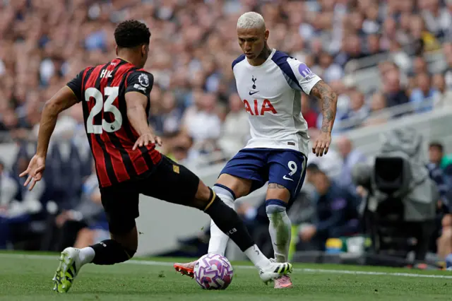 Bournemouth's English defender #23 James Hill (L) vies with Tottenham Hotspur's Brazilian striker #09 Richarlison (R)
