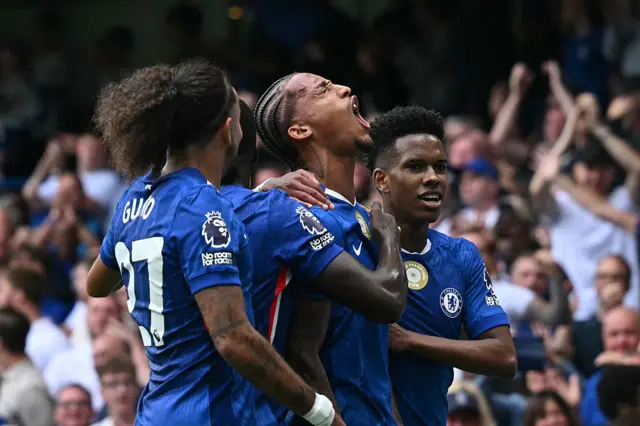 Chelsea's Brazilian striker #20 Joao Pedro (C) celebrates with teammates