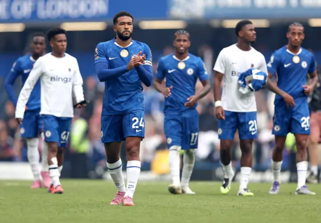 Reece James of Chelsea and teammates applaud fans after winning the English Premier League soccer match between Chelsea FC and FC Fulham,
