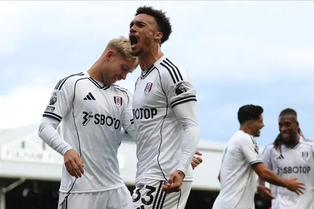 Fulham celebrating their goal against Manchester United
