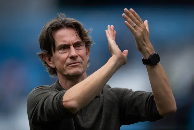 Thomas Frank applauding