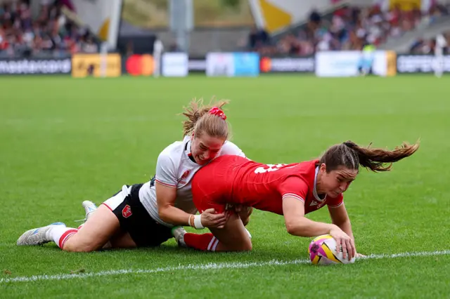 Taylor Perry scores a try for Canada against Wales