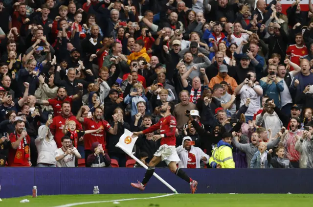 Manchester United's Bruno Fernandes celebrates scoring their third goal