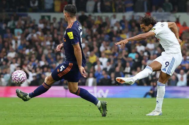 Leeds United's English striker #09 Dominic Calvert-Lewin (R) has a shot past Newcastle United's Swiss defender #05 Fabian Schar