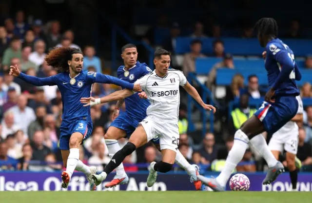 Fulham's Sasa Lukic in action with Chelsea's Marc Cucurella