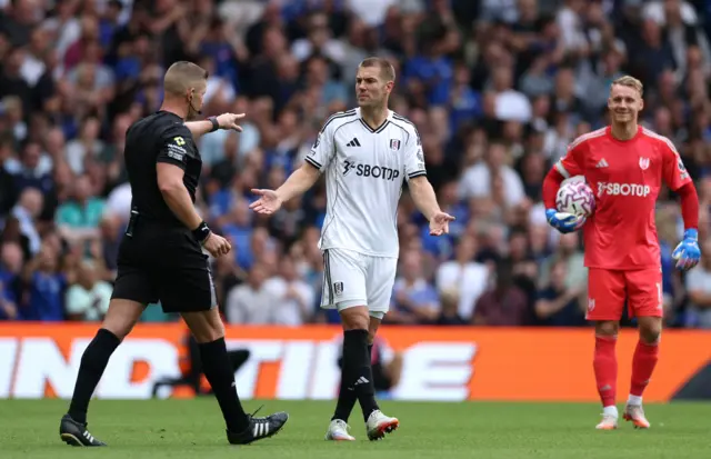 Referee Robert Jones awards Chelsea a penalty kick after a VAR review