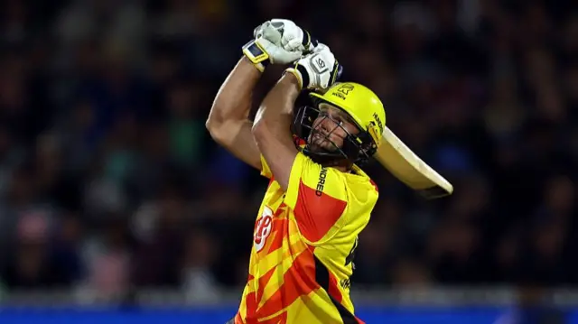 Ross Whiteley of Trent Rockets hits out for six