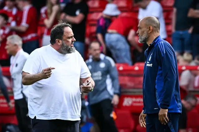 Nottingham Forest's Portuguese manager Nuno Espirito Santo (R) speaks with Nottingham Forest's Greek co-owner Evangelos Marinakis