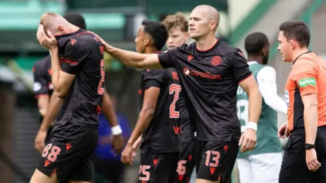 St Mirren's Killian Phillips (left) looks distraught