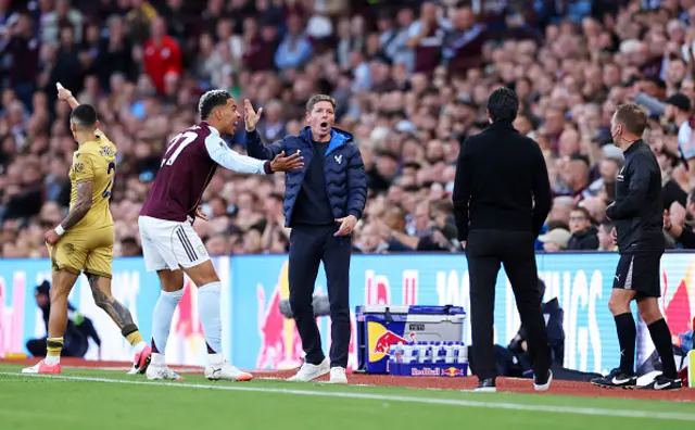 Oliver Glasner, Manager of Crystal Palace and Morgan Rogers of Aston Villa react