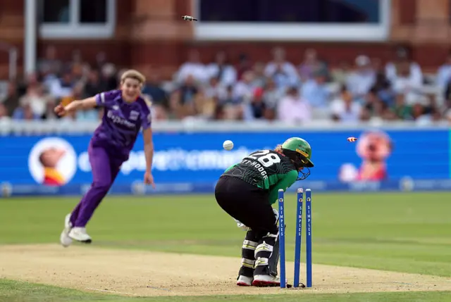 Danni Wyatt-Hodge of Southern Brave is bowled by Annabel Sutherland of Northern Superchargers