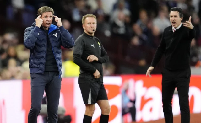 Crystal Palace manager Oliver Glasner and Aston Villa manager Unai Emery (right) gesture on the touchline